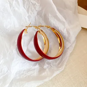 Chic burgundy red circular hoop earrings with vintage gold metal plating for women