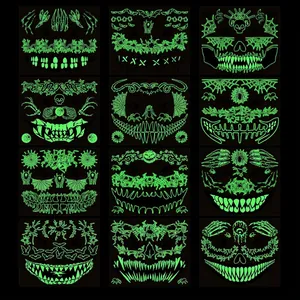 Luminous Halloween mouth and spider tattoos in 12 styles showing glow in the dark effect