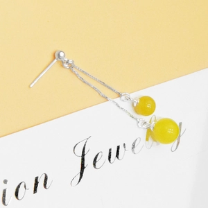 Close-up of S925 sterling silver drop earrings with yellow round beads and box chain