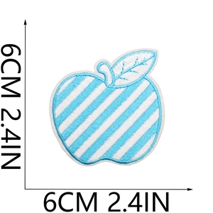 Detail view of apple embroidery patch with blue stripes and 6cm measurement scale
