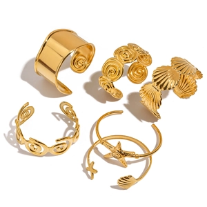 Five-piece 18K gold-plated ocean-style bangle set with hollow wave and starfish designs