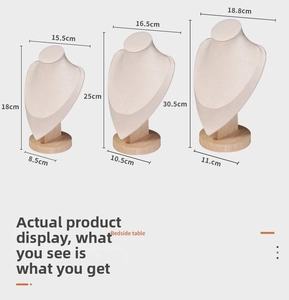 Three ivory jewelry display busts with beech wood bases showing height dimensions