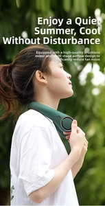 Detail of bladeless neck fan in dark green worn by a woman outdoors during summer