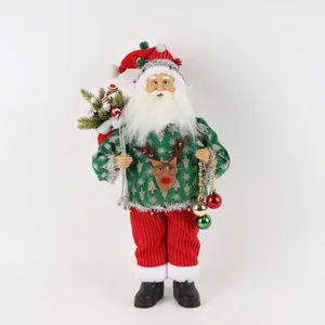 Detail of 45cm Santa figurine wearing green reindeer sweater and red striped trousers