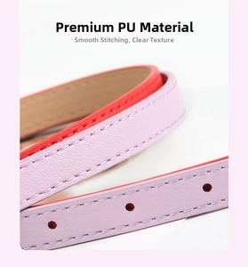 Macro detail of PU leather belt showing fine stitching and textures in purple and red