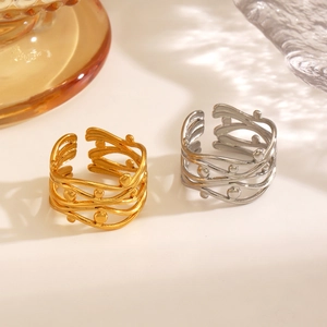 18K gold and silver plated stainless steel crossover rings with layered wavy lines