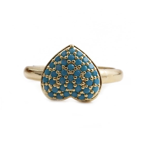 Detail of gold-plated copper ring featuring a heart-shaped turquoise zircon pavé setting