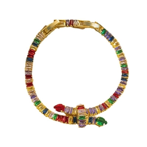 Luxurious gold-plated snake bracelet with colorful crystals and emerald accents