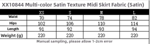 Detailed size chart for satin midi skirt listing measurements for XS to L sizes