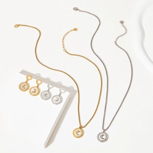 Stainless steel moon jewelry set featuring mother of pearl crescent necklace and earrings