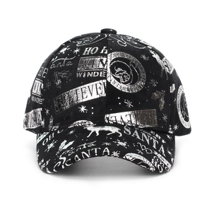 Black Christmas baseball cap with reflective silver Santa patterns and holiday prints