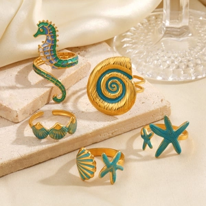 Marine theme adjustable gold rings set with starfish and seashell enamel designs