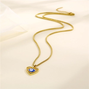 Golden heart necklace with blue evil eye pendant and colorful zircon stones on box chain
