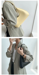 Minimalist beige and black PU leather hobo bags styled with a grey blazer outfit