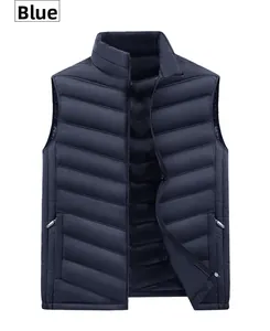 Detailed view of navy blue padded vest with stand collar, zipper pockets, and quilted texture