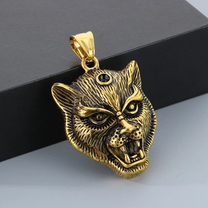 Detailed macro view of a gold-plated vintage leopard head pendant with punk style