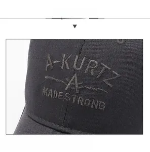 Close-up of A-KURTZ 3D embroidery on black cotton twill baseball cap with logo detail