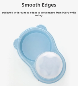 Detail view of smooth rounded corners on blue bear-shaped slow feeder pet bowl