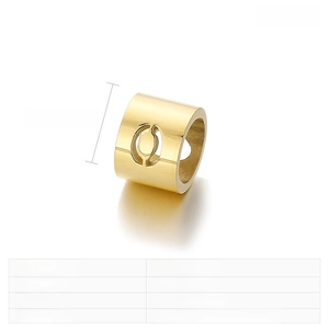 Detailed view of 8x6mm gold stainless steel cylindrical bead with hollow oval pattern