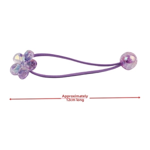 Detail view of purple camellia hair tie with crystal flower measuring about 12cm