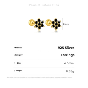 Detail view of S925 silver gold flower studs with black stone and screw back closure