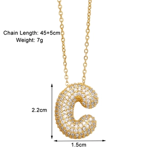 Detail of zircon-pave letter C pendant with dimensions 2.2cm and 45cm gold chain