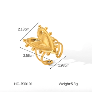 Detailed view of gold heart ring dimensions 3.56x2.13x1.98cm and weight 5.3g specs