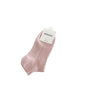 Pink ribbed cotton ankle socks for women with basic tag on a clean white background
