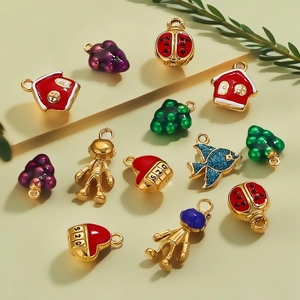 Colorful enamel astronaut and fruit charms in stainless steel for DIY jewelry making