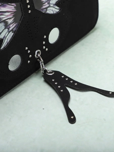 Matte black crossbody camera bag with silver studs and butterfly design details