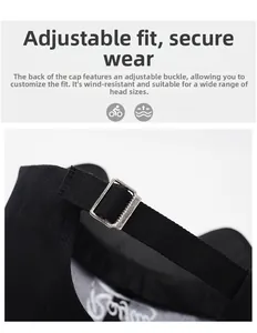 Detail of adjustable metal buckle and twill strap on black baseball cap for size fit