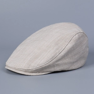 Close-up of herringbone texture on vintage cotton linen flat cap with classic weave