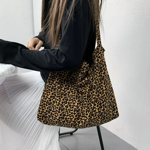 Large leopard print corduroy tote bag for women showing spacious interior and fabric texture