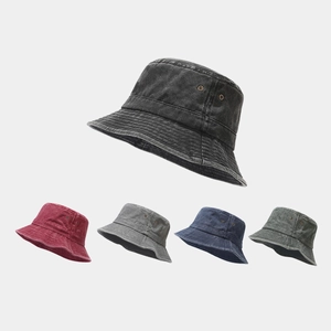 Classic washed denim bucket hats in multiple colors with breathable metal eyelets