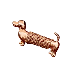Chic rose gold dachshund brooch with woven cord detail for stylish blazers and coats
