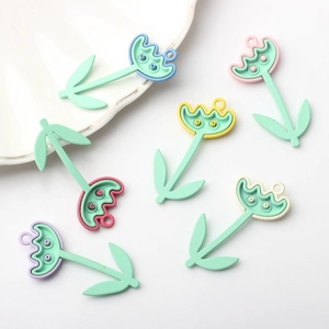 Close-up of six colorful alloy painted tulip flower charms for DIY jewelry making