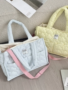 Quilted cloud puff tote bag with multi-pockets and adjustable pink shoulder strap