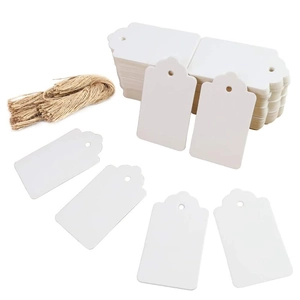 Scalloped white cardstock tags with jute twine for wedding and party favors