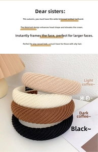Close-up of wide knitted headbands in brown, cream, and black with thick ribbed texture