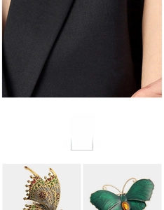 Detail of colorful butterfly brooches with enamel finish and sparkling crystal accents