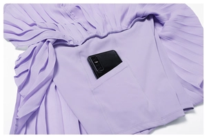 Detail of lavender pleated sports skirt with inner shorts and functional phone pocket