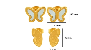 Detailed view of 18k gold butterfly earrings with shell inlay and metal texture