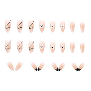 French nude almond press-on nails with cute dog motifs and black linear patterns