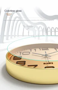 Detail of high-transparency colorless glass on 12-inch modern gold quartz wall clock