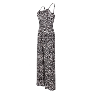 Detail showing leopard print pattern and thin shoulder straps on the jumpsuit