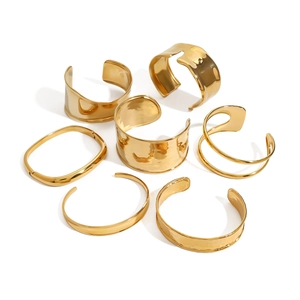 Polished gold stainless steel open bangles set in various minimalist geometric designs