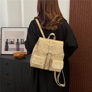 Retro cream faux leather backpack for women featuring a stylish flap pocket and metal buckle