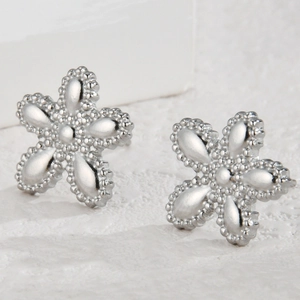 Minimalist silver flower stud earrings with textured metallic bead petal design