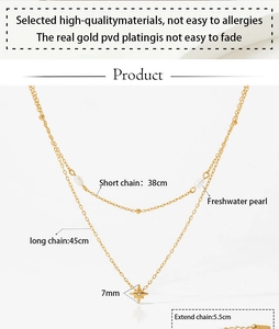 Detail of PVD gold plated double layer necklace with freshwater pearls and star pendant