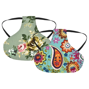 Close-up of dual-pack floral canvas chicken saddles with elastic straps for feather protection